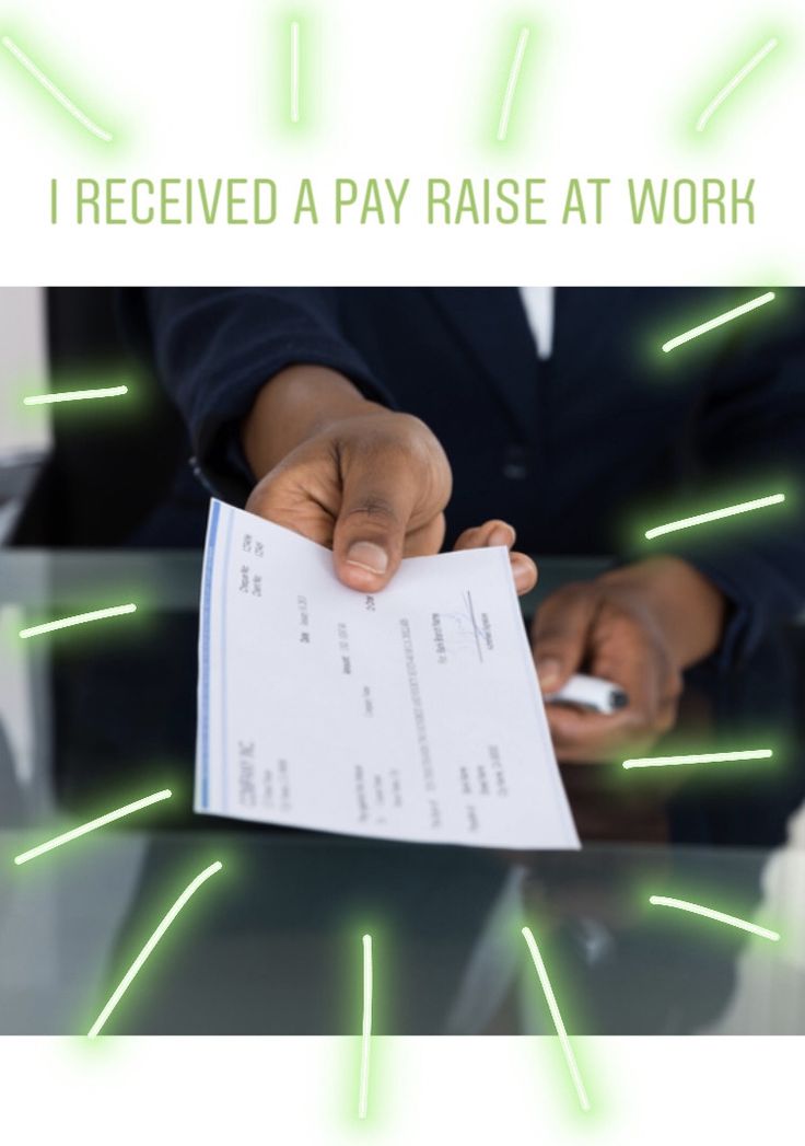 a person holding a piece of paper with the words i received a pay raise at work