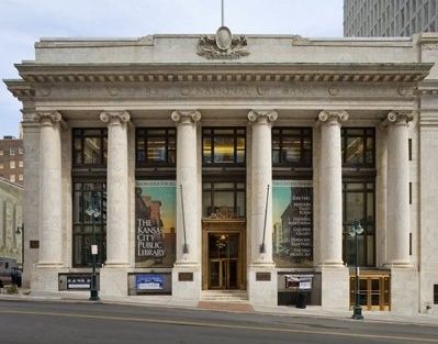 an old building with columns on the front