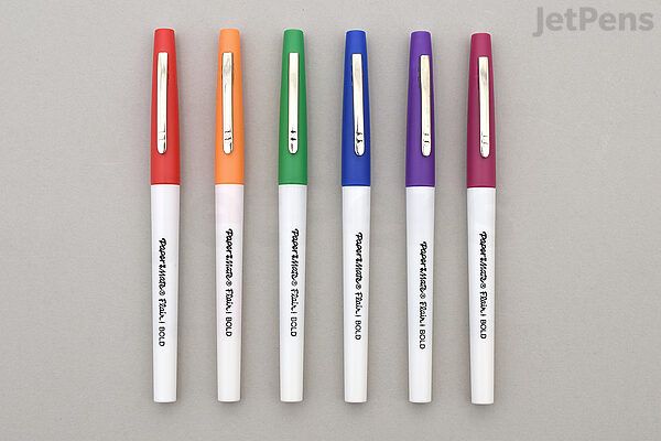 four different colored pens sitting next to each other on a white surface with the words letpens written on them