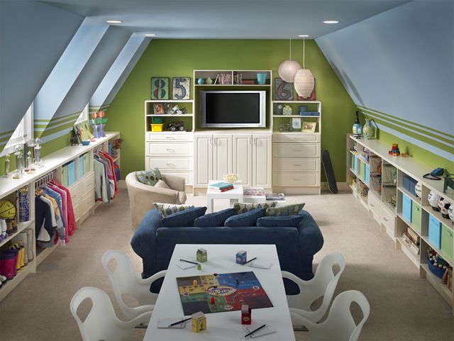 a living room filled with furniture and a flat screen tv mounted to the wall above it