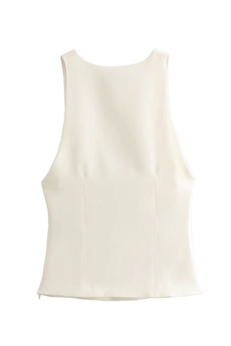 Goodnight Macaroon 'Dakota' V-neck Sleeveless Vest Sleeveless Elastic Slim Measurements XS - Bust 74cm, Length 55cm S - Bust 78cm, Length 56cm M - Bust 82cm, Length 57cm L - Bust 86cm, Length 58cm Machine cold and gentle cycle or hand wash cold Lay flat to dry Do not tumble dry Do not iron If you are unsure or need assistance selecting the proper size or color, please contact our Customer Services team and they'll be more than happy to help. Fitted V-neck Tank Top For Spring, Fitted Sleeveless Tank Top, Chic Sleeveless Vest Top, Sleeveless Vest Halter Top For Spring, Sleeveless Halter Top For Spring, Chic Fitted V-neck Tank Top, Chic White Sleeveless Crop Top, Solid Color Fitted Sleeveless Top, White Fitted Sleeveless Crop Top