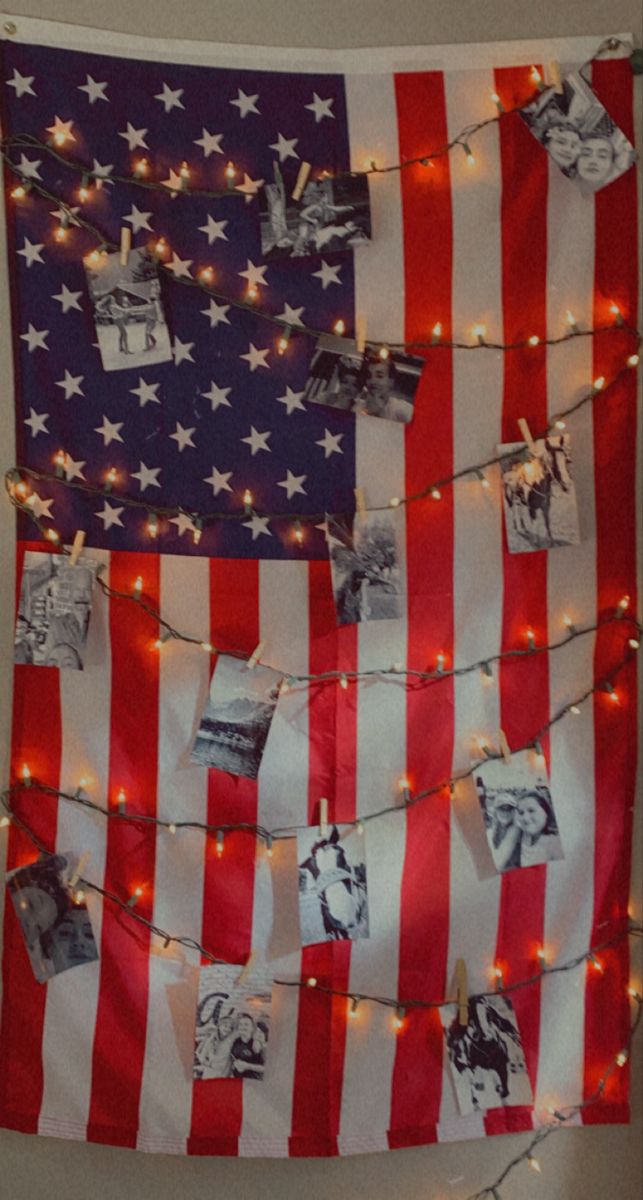 an american flag with pictures and lights on it