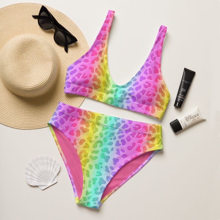 This 90s neon animal print inspired rainbow cheetah print bikini is perfect for the beach, a pride festival, 90s, Y2K, or bachelorette party. This high-waisted swimsuit features a flattering fit, and the bright colors will make you stand out from the rest. Combine two trends in one (while supporting a recycled product)! * 88% Recycled Plastic *Produced sustainably * Double-layered and non-reversible * Removable padding * Tear-away care label * LGBTQ+ woman owned shop Fitted Swimwear For Pride Beach Events, Fitted Swimwear For Beach And Pride Festival, Fitted Swimwear For Beach At Pride Festival, Multicolor Swimwear For Beach And Pride, Rave Multicolor Swimwear For Beach Season, Rave Multicolor Swimwear For Vacation, Rave Multicolor Swimwear For Swimming, Multicolor Rave Swimwear For Swimming, Multicolor Rave Swimwear For Vacation