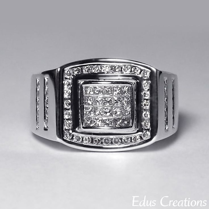 a white gold ring with diamonds on the sides and an open square design in the middle