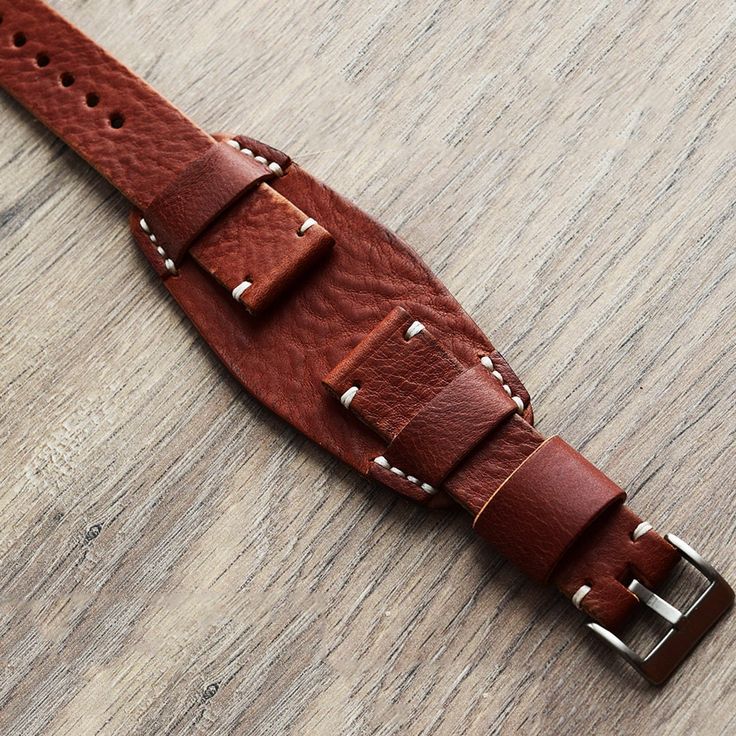 Leather Bund Strap,  Leather Watch Band,  Leather Watch Strap,  Apple Watch Band,  Cuff Band Strap,  Wrist Bracelet Watch,  iWatch Cuff Band Genuine Leather Handmade 18,20,22,24,26  mm Vintage Swiss leather Ammo watch strap Fits Panerai. Country/Region of Manufacture: Spain Style: Cuff Band Strap Material: Genuine Leather Hand Made, The wizard uses the highest grade leather made in Italy and Spain. Since the skin is natural. It is not repeated ever. All straps are different and have a unique beauty. Description: Width :18,20,22,24,26mm buckle like PAM:18,20,22,24mm Length : 80x 130 mm Strap Color: Brown Buckle: like Panerai, silver color or black. Thickness: 2mm-3mm Spain Style, Wrist Bracelet, Cuff Watch, Nato Strap, Leather Watch Strap, Leather Watch Bands, Leather Cuffs, Apple Watch Band, Personalized Leather