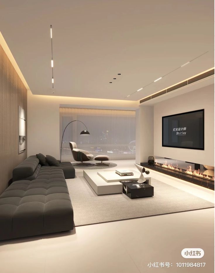 a modern living room with white walls and floor to ceiling lighting is featured in this image