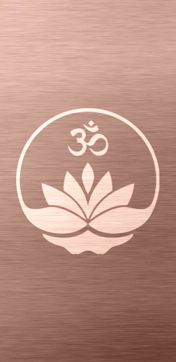 the om shan symbol is shown in white on a metallic background with a lotus flower