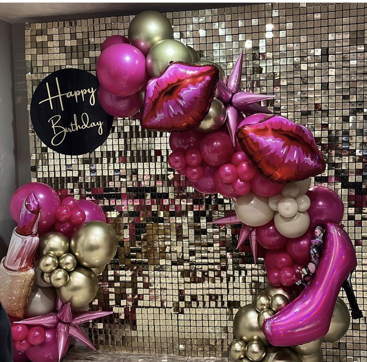 there is a birthday decoration made out of balloons