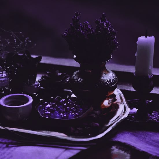 a tray with candles and other items on it