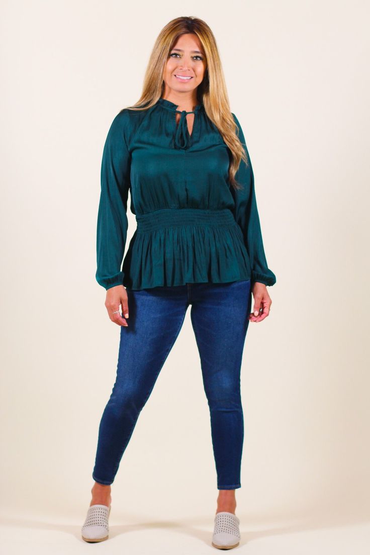 Chic long-sleeve blouse featuring smocked waist and subtle ruffled details. -Color: Hunter Green -Content: 100% Polyester -Imported -Runs true to size -Model is 5'5" 36-30-40 and wearing a size Small Chic Smock Peasant Top For Fall, Casual Smocked Blouse For Fall, Casual Smock Blouse For Fall, Long Sleeve Smocked Top With Ruffles For Fall, Chic Long Sleeve Peasant Top With Smocked Back, Long Sleeve Ruffled Smocked Top For Fall, Chic Smocked Top With Ruffles For Fall, Casual Smocked Top With Blouson Sleeves, Chic Peasant Top With Smocked Back For Fall