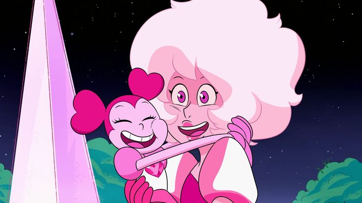 two cartoon characters hugging each other in front of a pink obelisk at night