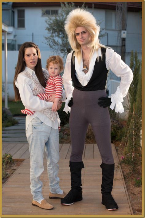 two women and a child are dressed up as the characters from beetlejuicen