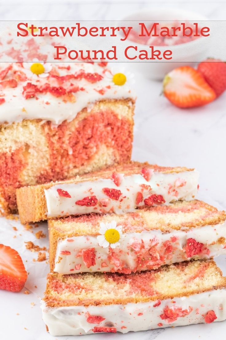 strawberry marbe pound cake with white frosting and strawberries on the top slice