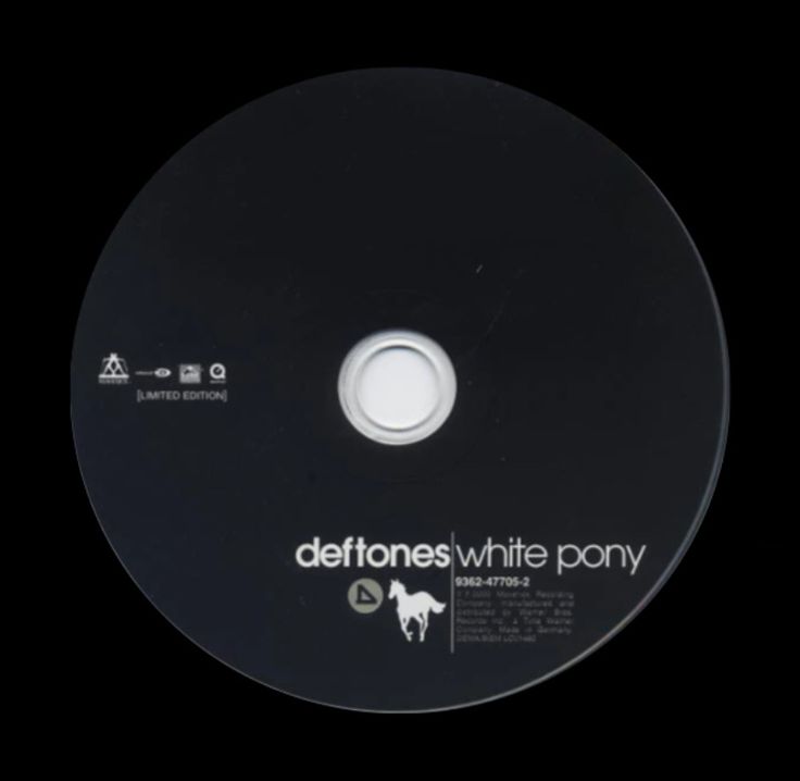 a cd disc with the words deftones white pony on it's front cover