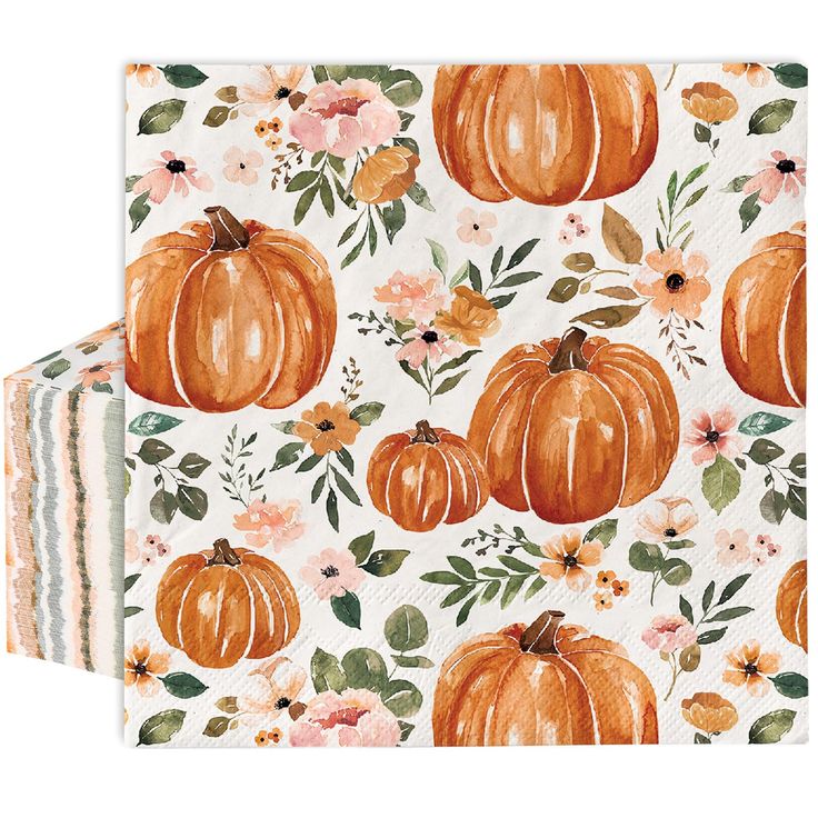 two napkins with orange pumpkins and flowers on them, one is folded to the side