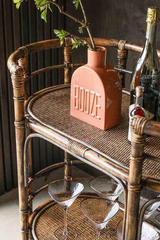 a table with wine glasses and bottles on it