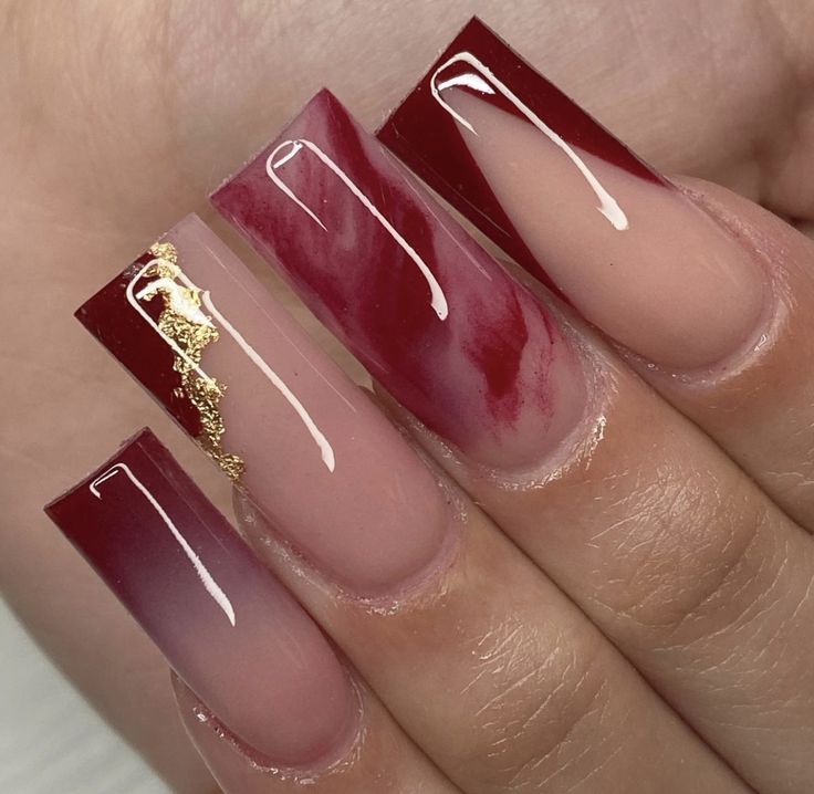 Red And Beige Nails Acrylic, Medium Red Nails Design, Maroon Graduation Nails, Cherry Wine Nails Design, Marble Burgundy Nails, Wine Prom Nails, Red Nail Designs Medium Length, Red Nails Graduation, Red Nails Aesthetic Dark