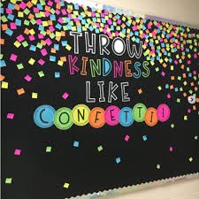 a bulletin board that says throw kindness like confetti