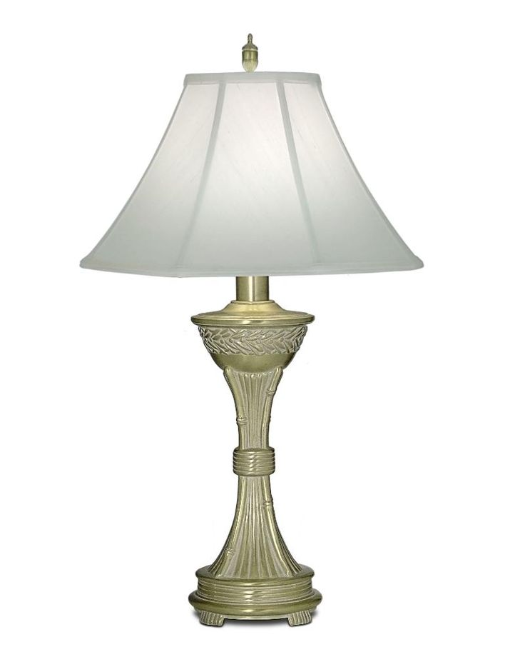 a lamp with a white shade on it