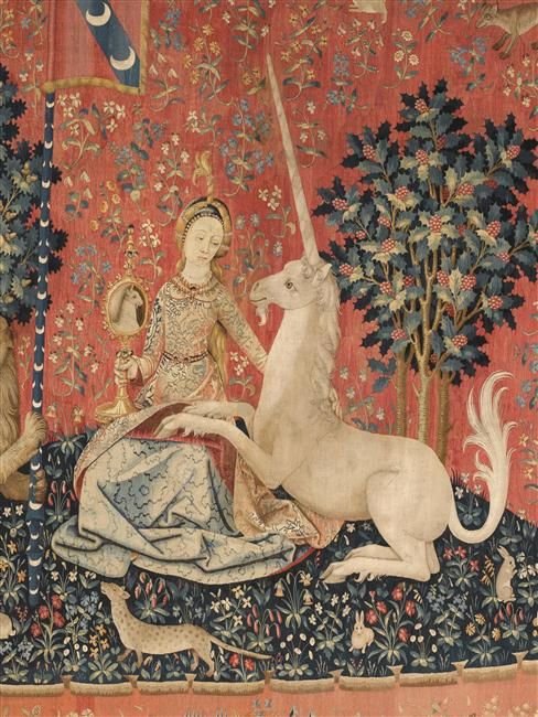 the unicorn and lady are depicted in this medieval painting