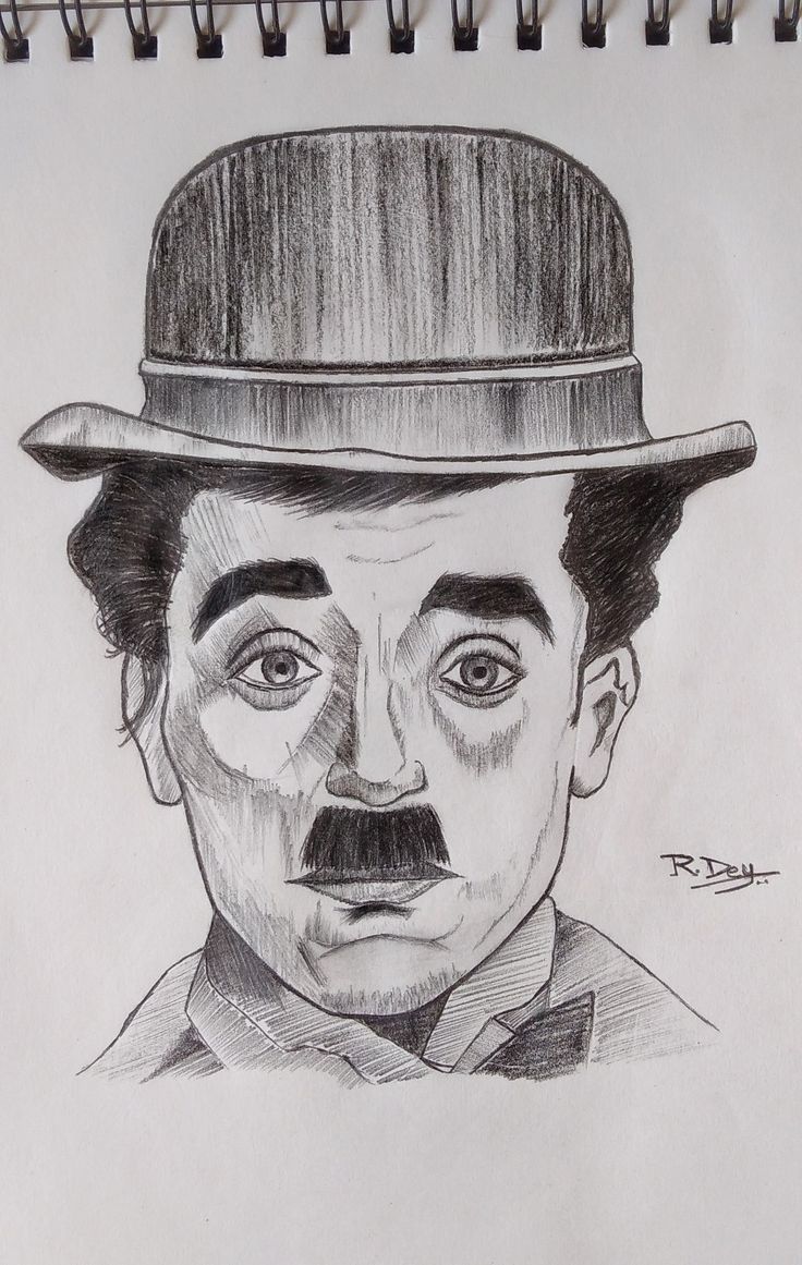 a drawing of a man with a hat and mustache on top of his head is shown