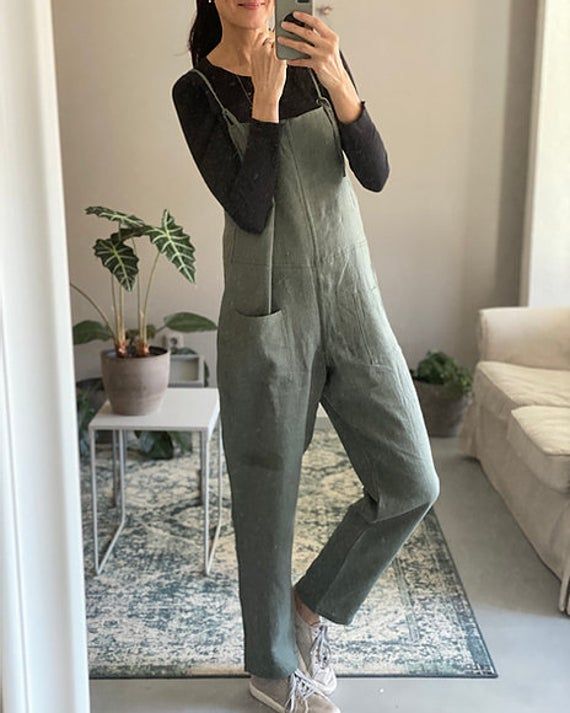 * 100% soft linen, 200 g/m2 * Relaxed fit * Full leg length * Adjustable straps * Two front pockets * Handmade in Slovakia Measurements: Size XS Recommended body measurements: Bust: 77 - 82 cm Waist: 60 - 65 cm Hips: 81 - 85 cm Height: 150- 155 cm --------------------------- Size S Recommended body measurements: Bust: 83 - 88 cm Waist: 66 - 71 cm Hips: 87 - 91 cm Height: 156-162 --------------------------- Size M Recommended body measurements: Bust: 89 - 94 cm Waist: 72 - 77 cm Hips: 92 - 98 cm Linen Overalls, Linen Wrap Dress, Timeless Outfits, Womens Jumpsuits, Skirt With Buttons, Linen Jumpsuit, Linen Skirt, Linen Trousers, Linen Women