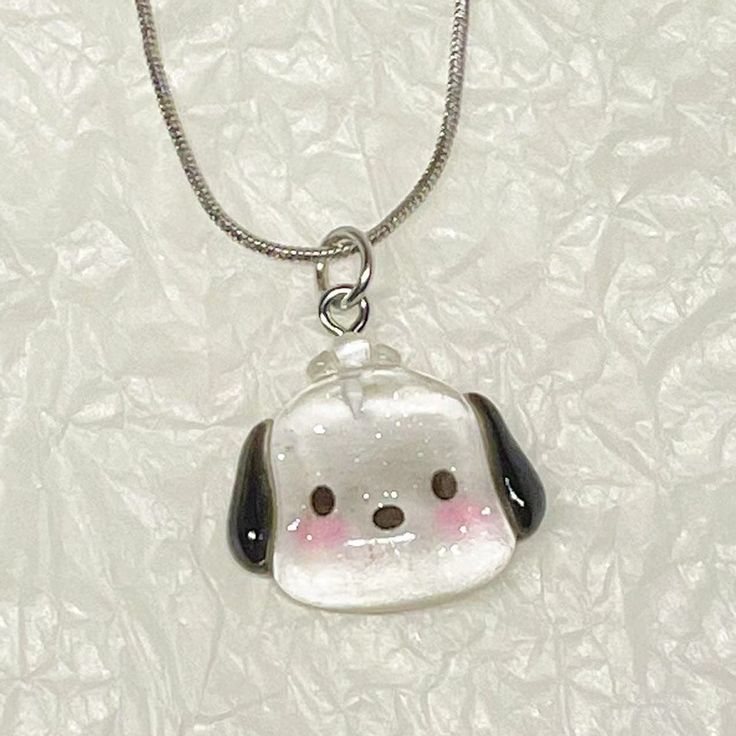 📿 Sanrio Kawaii Necklace Pendant - Adorn Yourself with Cuteness 📿 ✨ Charming Adornment: The Sanrio Kawaii Necklace Pendant isn't just any necklace; it's a delightful accessory that adds charm and style to your attire. Featuring various beloved Sanrio characters, this pendant brings a touch of cuteness to your fashion choices. 💖 Charming Design: With iconic Sanrio characters adorning this pendant, every time you wear it, you celebrate the timeless charm and cuteness of your favorite friends. I White Kawaii Charm Necklace For Gift, Cute Dangle Charm Necklaces For Jewelry Making, Silver Kawaii Necklace For Gift, Silver Kawaii Necklace As Gift, Cute White Jewelry With Lobster Clasp, Kawaii Handmade Silver Necklaces, Kawaii Jewelry With Cute Adjustable Design, Kawaii White Jewelry For Gifts, Kawaii Silver Handmade Necklaces