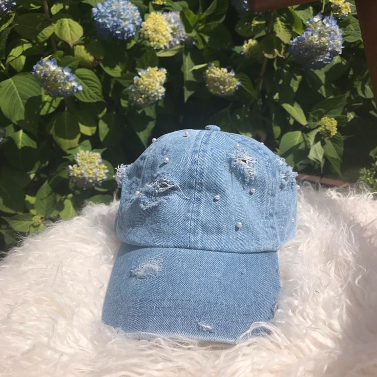 This Handmade Distressed Denim And Faux Pearl Hat Is So Unique And Perfect For Summer! The Pearls Are Affixed With Metal Prongs So They Stay Firmly In Place. Also Available In Other Colors In My Closet. Bundle With Other Items To Save 10% And Save On Shipping. Buy With Confidence: 5 Star Rated Top Seller And Fast Shipper Denim Hat / Dad Hat / Dad Cap / Ponytail Hat / Distressed Hat / Distressed Jeans / Destroyed Denim / Embellished Hat Trendy Distressed Baseball Cap, Trendy Distressed Dad Hat, Trendy Distressed Adjustable Dad Hat, Denim Snapback Hat, Casual Distressed Cap, Spring Distressed Adjustable Baseball Cap, Distressed Adjustable Baseball Cap For Spring, Trendy Distressed Dad Hat With Curved Brim, Trendy Curved Brim Distressed Dad Hat