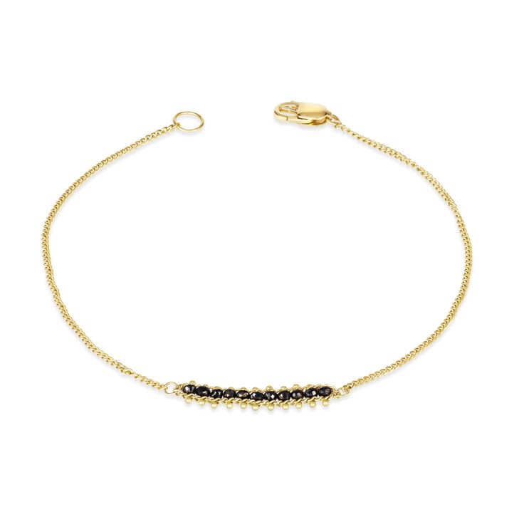 A row of glistening Black Diamonds forms the focal point of this slender, striking bracelet. The gems are caught up in a length of hand-woven 18K yellow gold chain that encircles the wrist like a shimmering strand of captured sunlight. The result is as distinctive as it is easy to wear, a quiet luxury that is all the more powerful for its subtlety. Technical Details Metal: 18k yellow goldBlack DiamondLength: 7"Handmade in New YorkStyle # B-1607-BLKD Elegant Box Chain Bracelet For Everyday Luxury, Fine Jewelry Round Box Chain Bracelets, Elegant Box Chain Bangle Jewelry, Elegant Gold Plated Bracelets With Box Chain, Elegant Yellow Gold Bracelets With Adjustable Chain, Elegant Yellow Gold Bracelet With Adjustable Chain, Elegant Gold Plated Box Chain Bracelets, Elegant Gold Diamond Bracelet With Box Chain, Elegant Box Chain Bangle