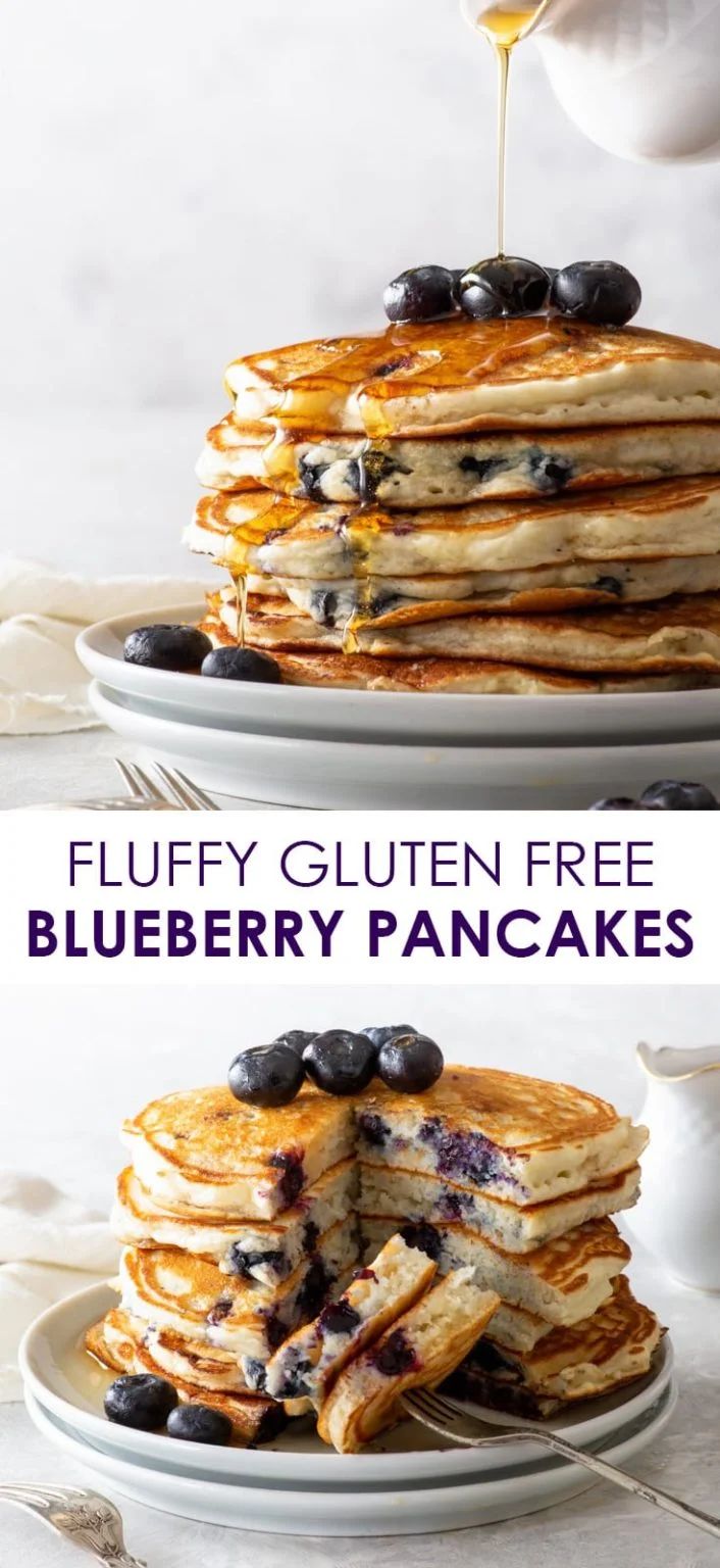 blueberry pancakes with syrup being drizzled on top and topped with fresh blueberries