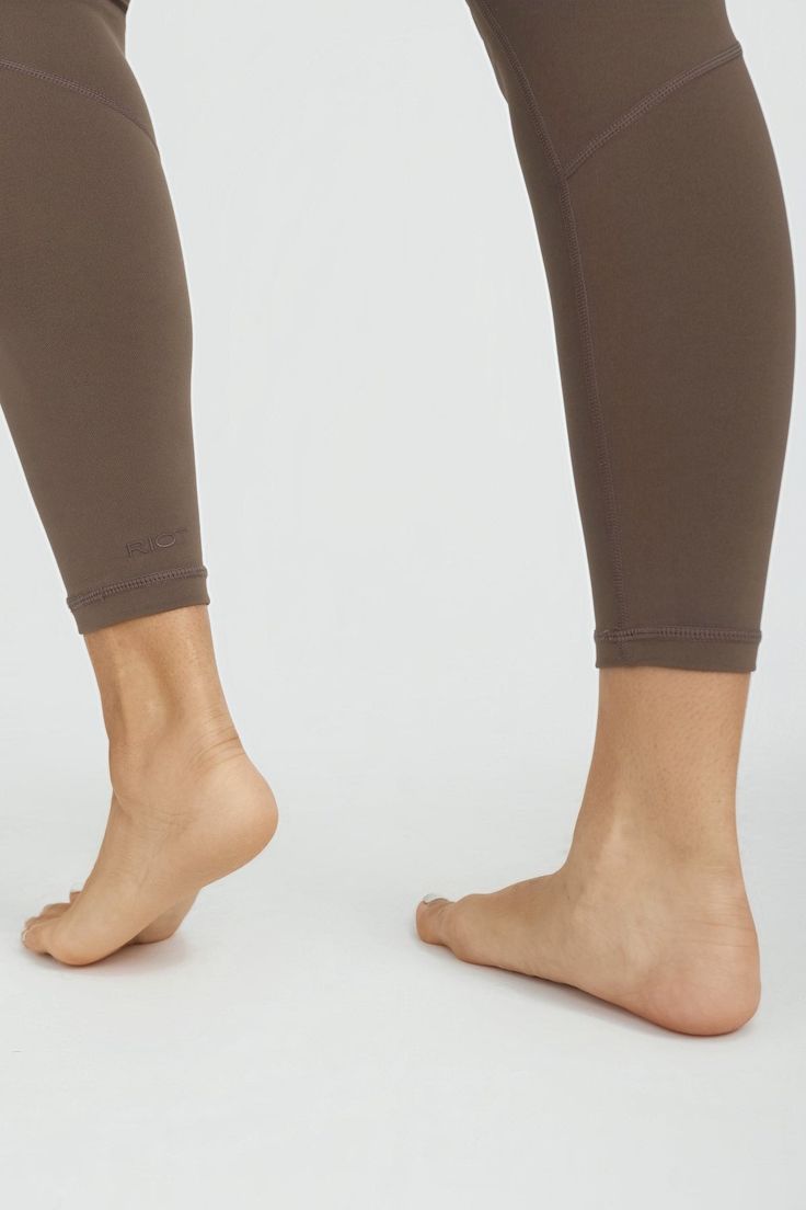 Make every workout feel like a walk in the park with the BRONX Zip Front Leggings – your new secret weapon for both style and function. With a high-rise waist secured by a sleek zipper, these leggings offer a snug fit that stays in place, giving you a streamlined look without sacrificing comfort. The fabric is a dream, with just the right amount of stretch to contour your body and move with you, without ever feeling restrictive. The innovative zip front isn't just for looks – it means easy on an High-cut Leg Activewear For Yoga With 4-way Stretch, High Rise Sporty Tights For Pilates, Sporty High Rise Tights For Pilates, High-cut Leg Athleisure For Pilates, Compressive High-cut Athleisure Leggings, High-cut Leg Athleisure Yoga Pants, Sporty Compression High-waisted Leggings, Sporty Compression High-cut Leggings, Sporty High-cut Workout Leggings