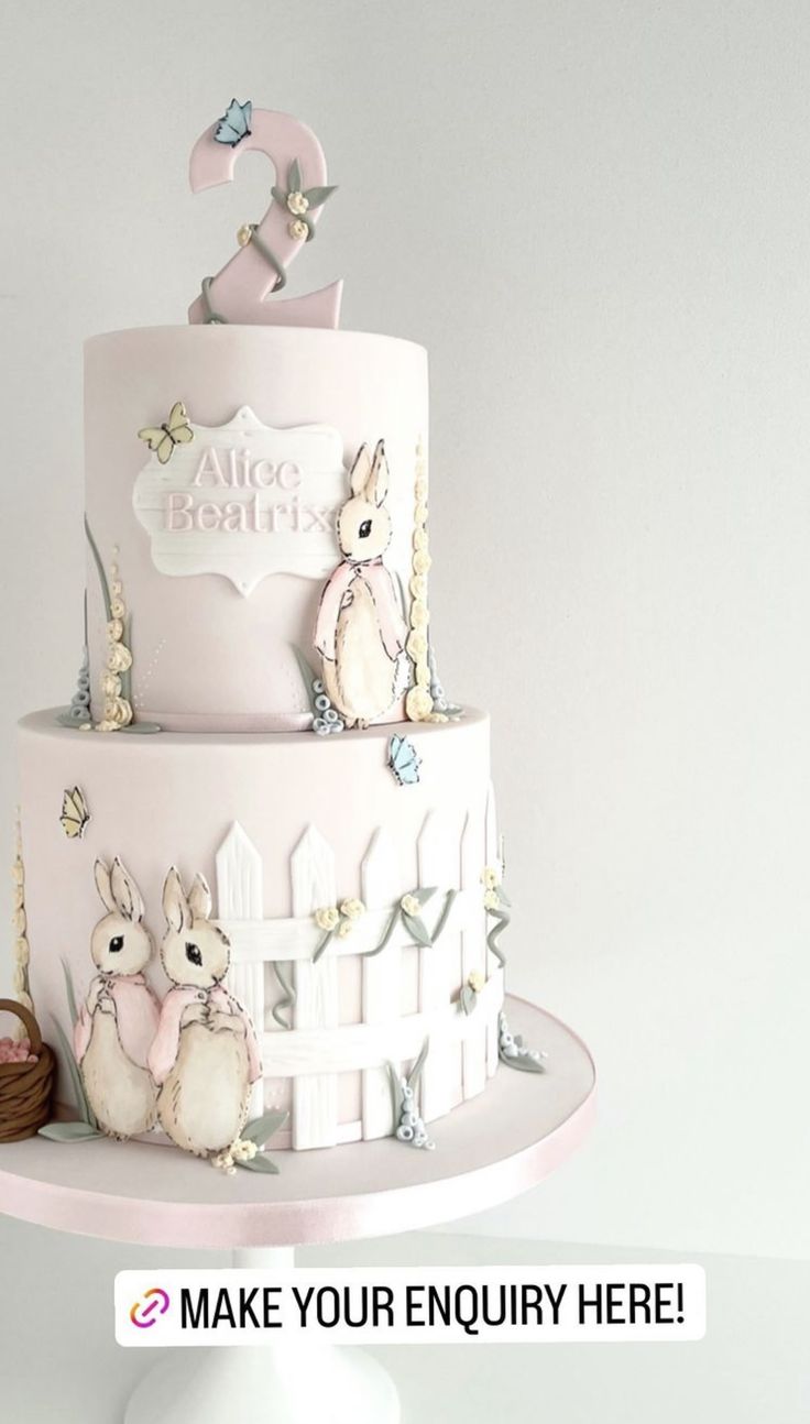 a three tiered cake with rabbits on it and the words make your enquiry here