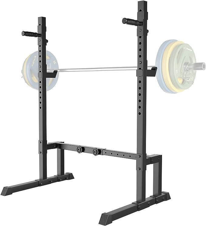 a squat machine with two barbells attached to the front and back of it