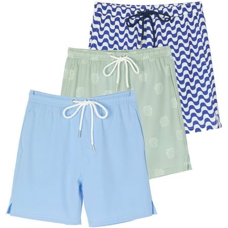 Dive into summer fun with the Real Essentials 3 Pack: Boys' 2 in 1 Swim Trunks with Compression Boxer Liner! Designed to keep up with your active young swimmer, these swim trunks are the ultimate blend of style, comfort, and functionality. Featuring a 2 in 1 design, our swim trunks come with a Compression Boxer Liner that provides unparalleled support and comfort, allowing your little one to move with ease in and out of the water. No more uncomfortable tugging or adjusting - our swim trunks stay Blue Bottoms For Beachwear In Summer, Blue Beachwear Bottoms For Summer Activities, Beachwear Swim Trunks With Built-in Shorts For Summer Activities, White Swim Trunks For Summer, Blue Summer Shorts For Summer Activities, White Bottoms For Summer Beach Activities, White Bottoms For Beach Season, Short Swimwear For Summer Activities, White Bottoms For Beach Season Summer Activities