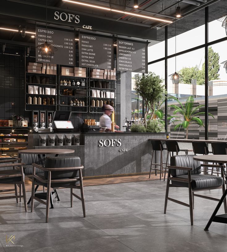 the interior of a restaurant with tables, chairs and menus on the wall behind them