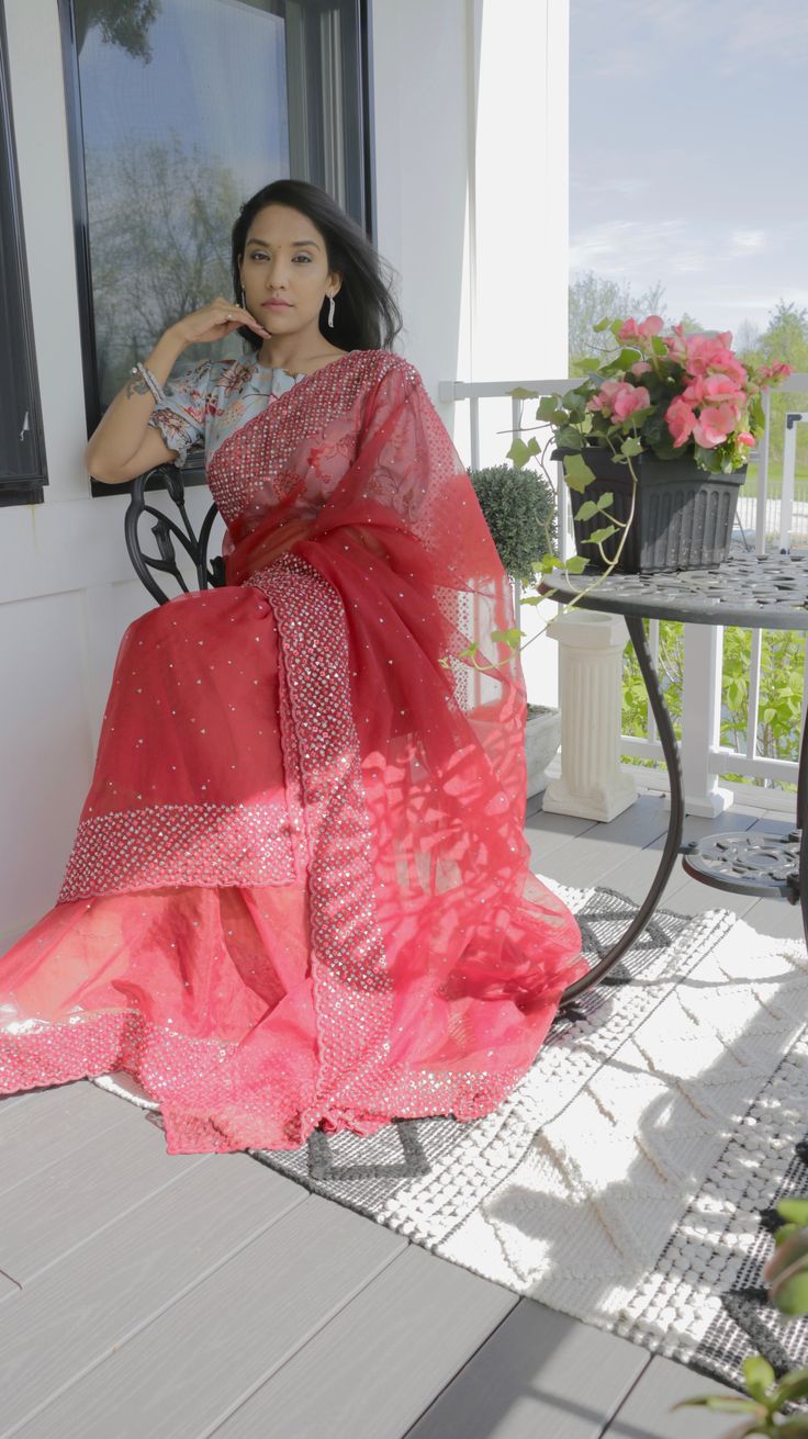 Red Organza saree w/ custom Blouse. For Custom Blouse Pls contact us. Saree ships immediately within the US and the Blouse 2 weeks later. Red Blouse With Sheer Dupatta For Navratri, Transitional Organza Saree With Unstitched Blouse, Red Pre-draped Saree With Cutdana For Celebrations, Festive Celebration Blouse With Sheer Dupatta, Red Traditional Blouse With Sheer Dupatta, Fitted Red Blouse With Sheer Dupatta, Red Georgette Blouse With Sheer Dupatta, Festive Red Blouse With Sheer Dupatta, Designer Red Pre-draped Saree With Self Design