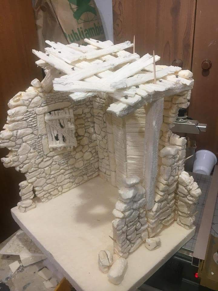 a cake made to look like a stone house