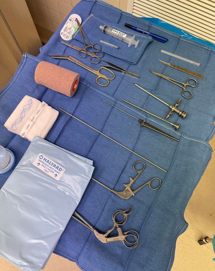 an assortment of medical supplies laid out on a table