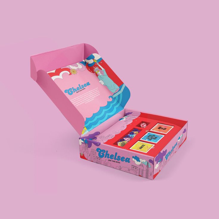 an open pink box with pictures on the lid and inside, sitting on a pink background