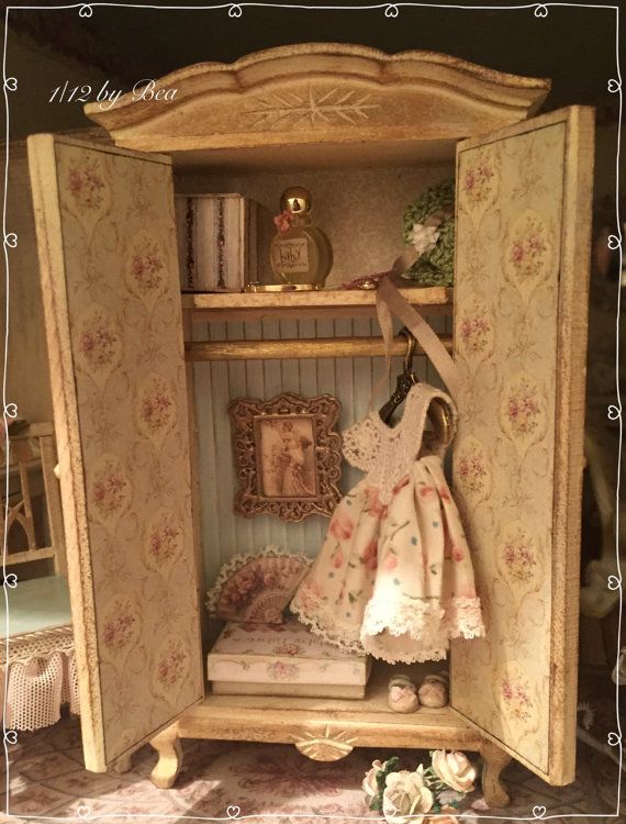 a doll is standing in the open closet