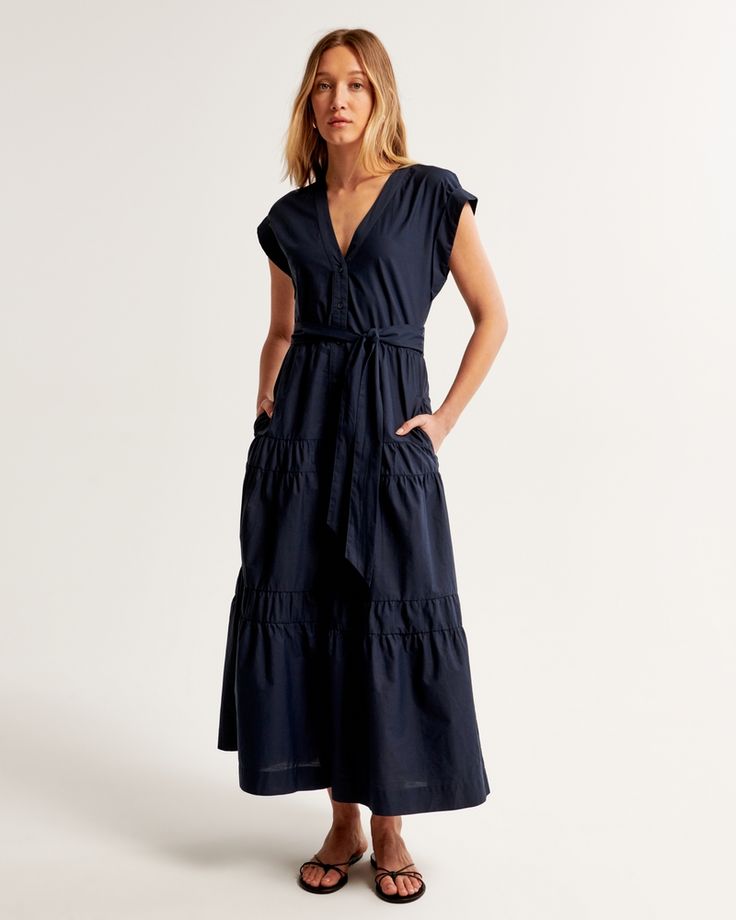 Flattering short-sleeve maxi dress in our classic poplin fabric and relaxed-fit silhouette, featuring functional tie-waist detail, button-through detail, v-neckline and a tiered skirt. Female Features, Tie Waist Maxi Dress, Navy Blue Maxi Dress, Tie Maxi Dress, Women's Tie, Short Sleeve Maxi Dresses, Womens Tie, Maxi Dress With Sleeves, Tiered Skirt