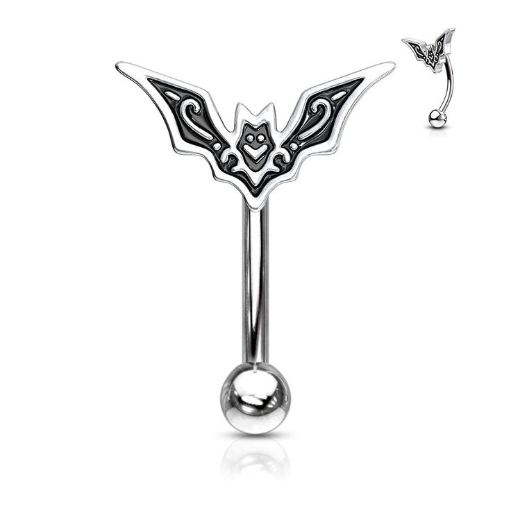 a silver belly ring with a bat design on the top and a ball at the bottom