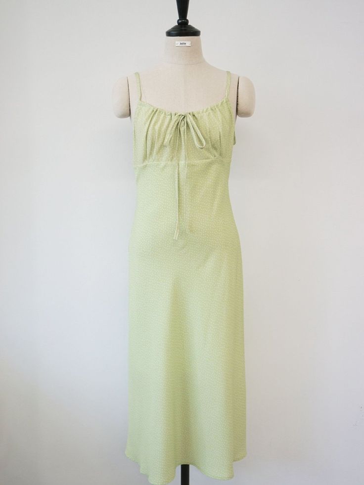 Spring Ruched Sundress For Daywear, Summer Midi Length Dress With Drawstring, Summer Midi-length Dress With Drawstring, Casual Spring Dress With Knotted Straps, Spring Beach Midi Dress With Drawstring, Spring Green Midi Dress With Adjustable Straps, Green Midi Dress With Adjustable Straps For Spring, Midi Length Drawstring Dress For Day Out, Green Summer Dress With Drawstring