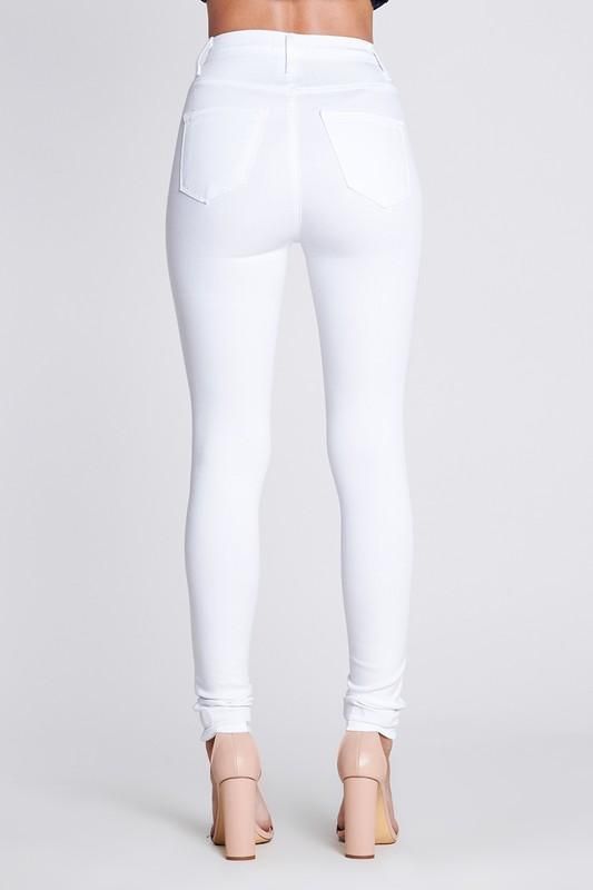 Details 5 Button skinny High waisted Stretchy and soft material Runs tight - May need to size up Size 3: Waist: 25" Rise: 11", Inseam: 31.5" Materials & Care 68% Cotton, 23.8% Modal, 7% T400, 1.2% Spandex Made in the USA High Rise White Jeans, Olive Green Jeans, Green Jeans, Dark Blue Jeans, Black Midi Skirt, Faux Leather Leggings, Leather Leggings, White Fabric, Cool Fabric