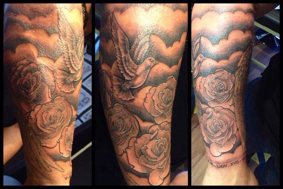 three different views of the same arm with roses and doves on it, one in black and white