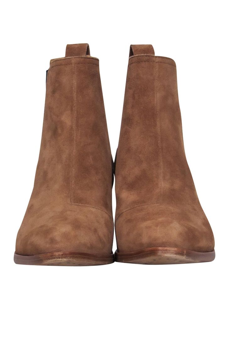 Every fashionista needs a chic pair of booties in their closet, so grab these ones from Rag & Bone before they're gone! With soft suede in a neutral camel hue, these heeled beauties are the ultimate fall staple. Whether you're headed to an apple orchard or a haunted house, style these with jeans and a flannel, grab a pumpkin spice latte and you'll be good to go! Size 5 Suede upper Slip on Short shaft Round toe Stacked heel Leather sole and footbed w/ some wear Original box included Heel 2" Casual Camel Boots For Fall, Brown Suede Chelsea Boots For Fall, Chic Brown Suede Chelsea Boots, Brown Suede Booties For Fall, Brown Booties With Suede Lining For Fall, Winter Suede Booties With Almond Toe, Brown Suede Ankle-high Booties, Brown Suede Booties With Suede Lining, Chic Brown Suede Booties