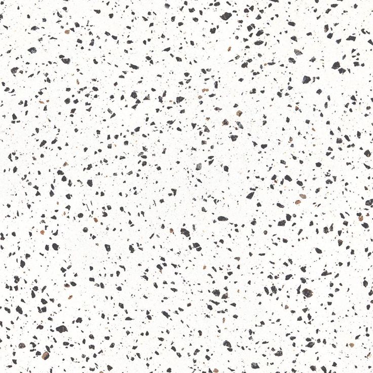 a white and black speckled surface is shown