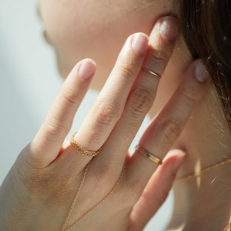 Glinting and gossamer - as fine as can be. Prone to glimmering, extremely talented at catching the light. Our new favorite. Works beautifully on its own - we particularly love it as an index finger ring, but don't let us hold you back. Have your way - whisper your own Sweet Nothing. Dainty Hypoallergenic Open Band Jewelry, Adjustable Delicate Diamond Cut Jewelry, Delicate Tiny Toe Ring Jewelry, Delicate Toe Ring Jewelry, Dainty Gold Promise Chain Ring, Gold Dainty Promise Chain Ring, Fine Jewelry Hypoallergenic Promise Ring, Elegant Hypoallergenic Open Band Jewelry, Elegant Hypoallergenic Midi Rings For Promise