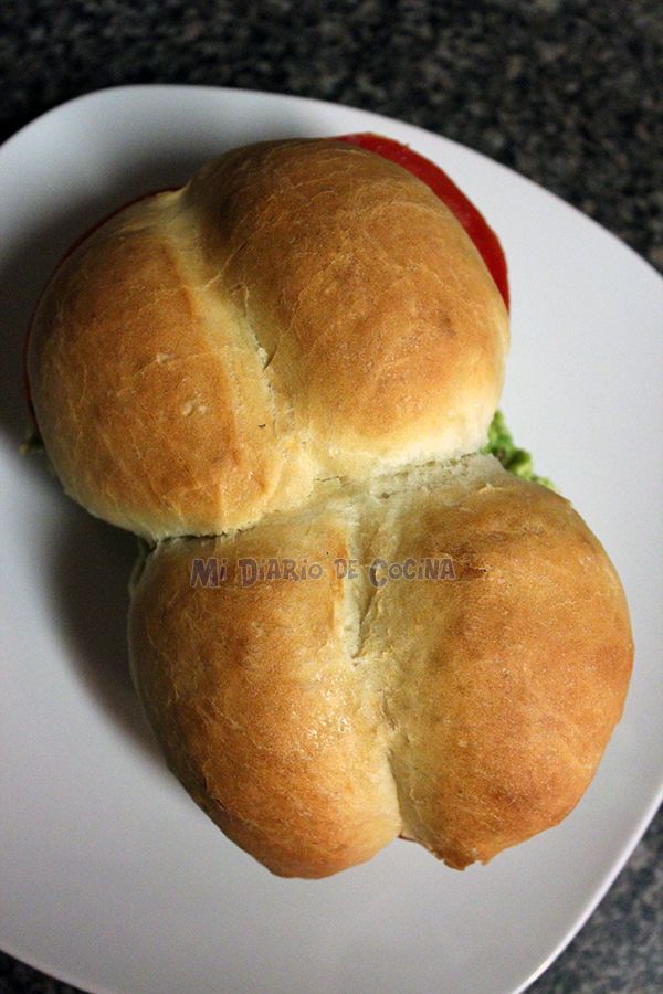 two pieces of bread on a white plate