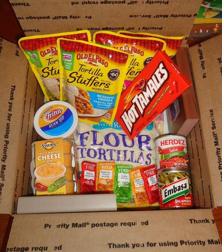 a box filled with lots of food on top of a table